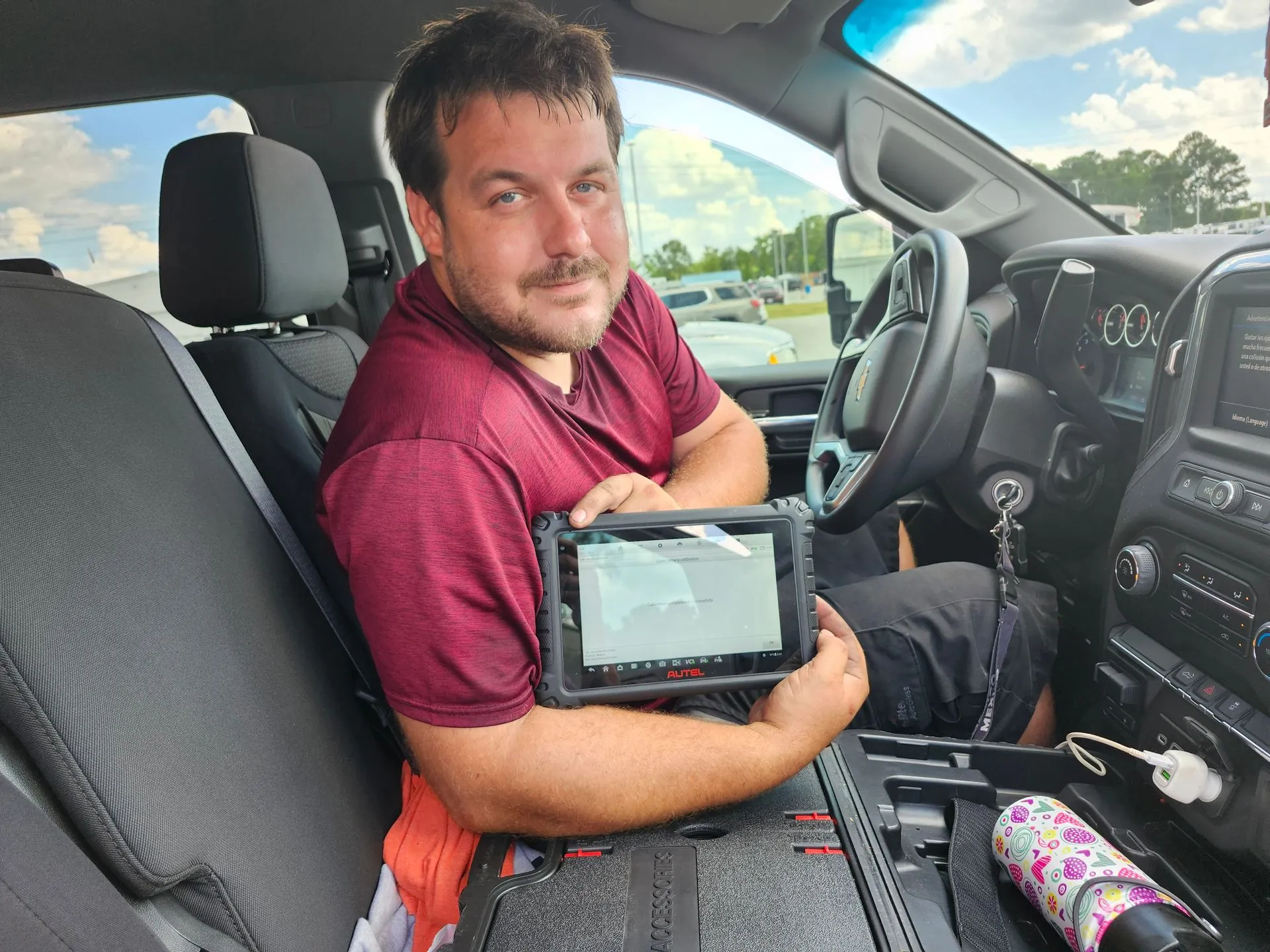 ADAS calibration diagnostic tablet used during windshield camera recalibration in Charleston SC