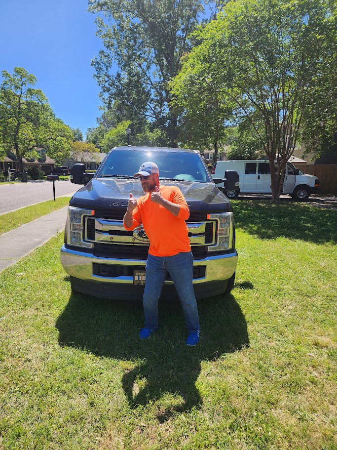 Happy customer with completed Ford F-250 windshield replacement