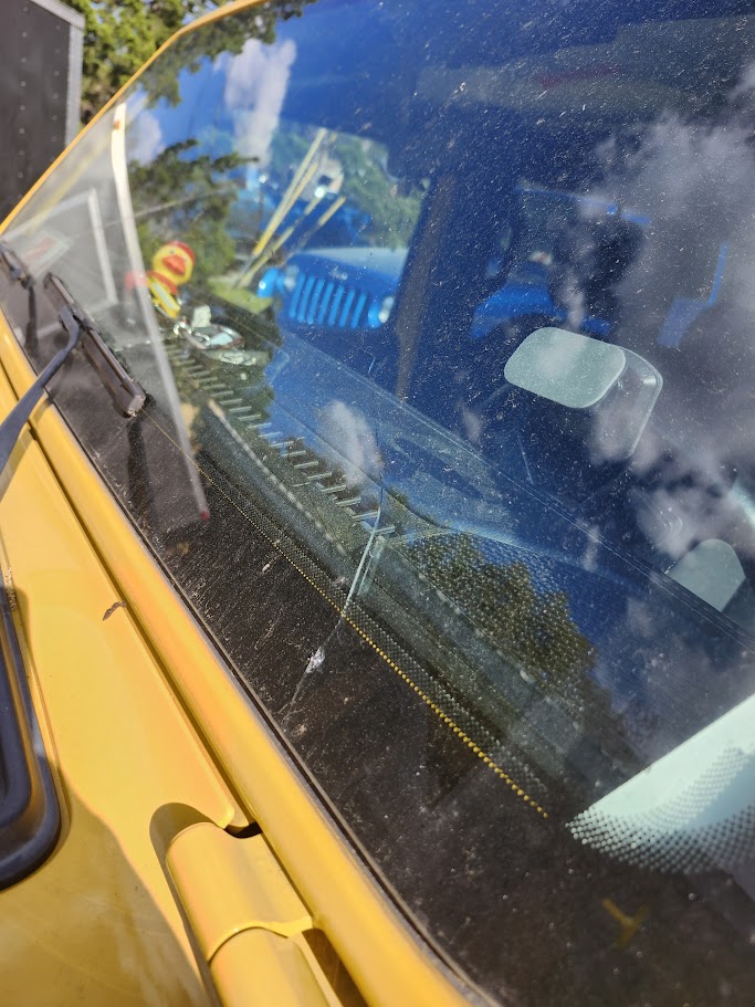 SUV windshield glass installation in progress at a North Charleston location