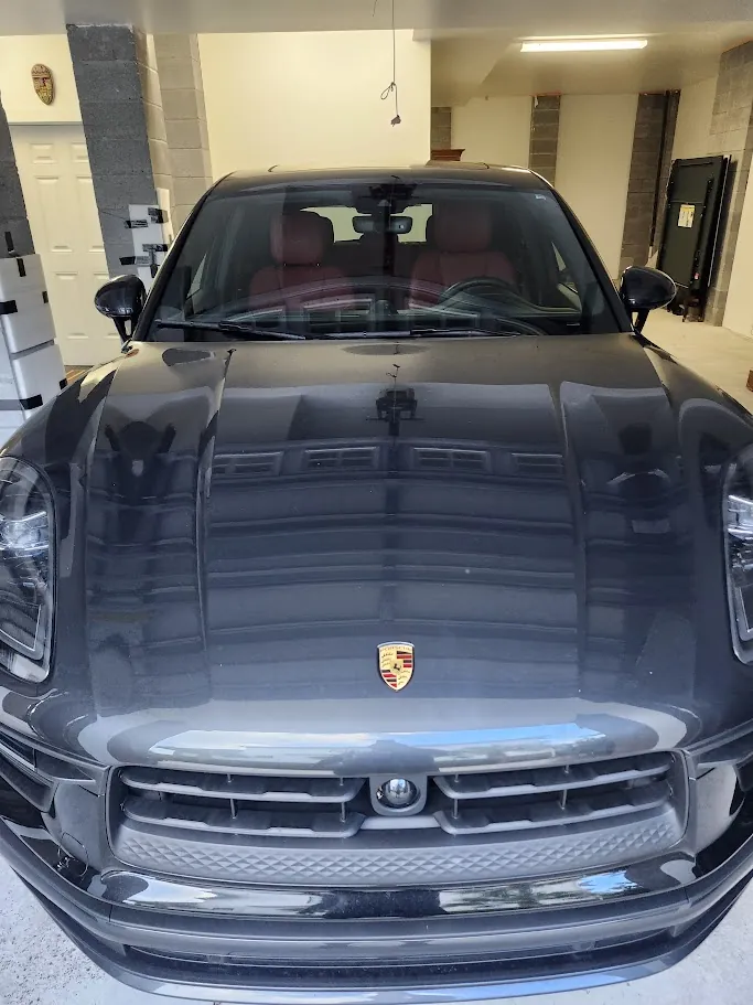 Completed windshield replacement on Porsche Cayenne luxury vehicle in Charleston SC